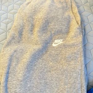 Like NEW Nike unisex small Gray Sweatpants. Great fit and style so comfortable!
